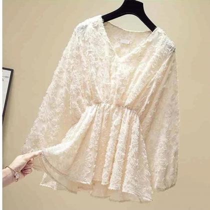 Elegant White Pleated Blouse With Flared Sleeves..