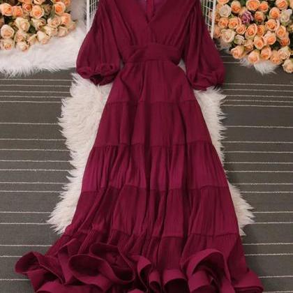 Elegant Burgundy V-neck Tiered Ruffle Maxi Dress..
