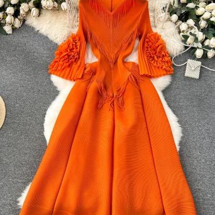 Elegant Orange Pleated Midi Dress With Ruffle..
