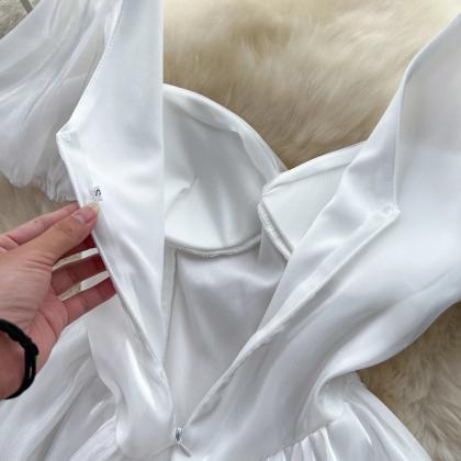 Elegant White V-neck Puff Sleeve Skater Dress..