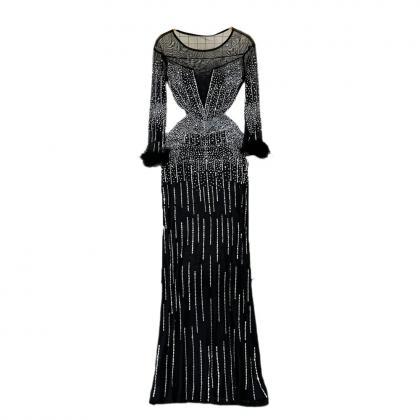 Elegant Long Sleeve Sequin Gown With Faux Fur..