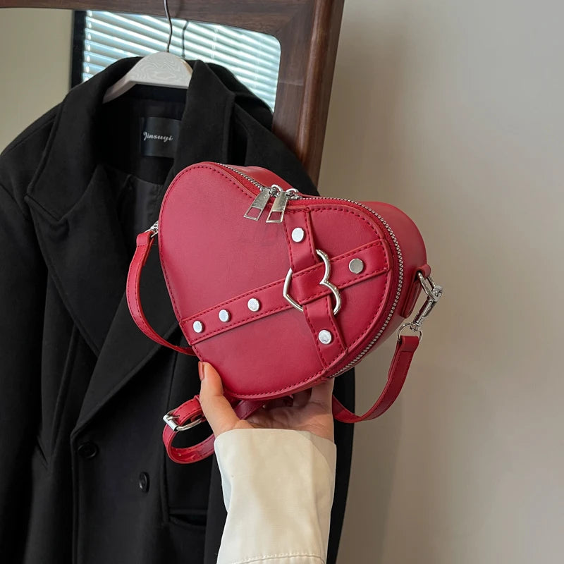 Chic Red Heart-shaped Crossbody Bag With Silver Accents