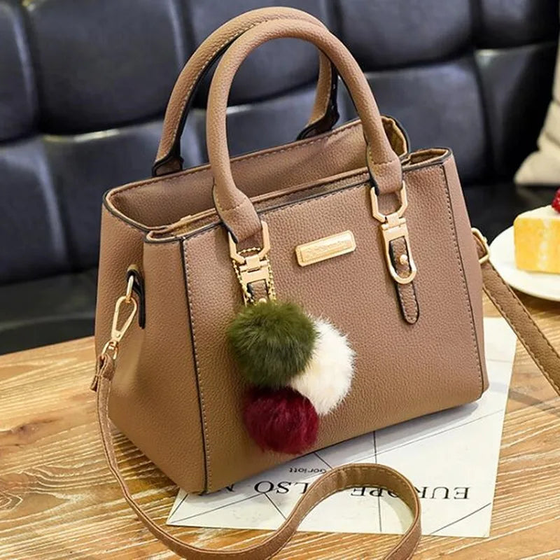 Elegant Brown Tote Handbag with Pom Pom Charm