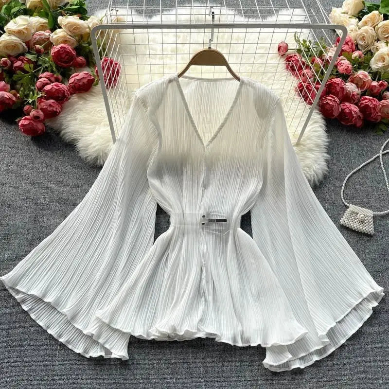 Elegant White Pleated Blouse With Flared Sleeves And Belt