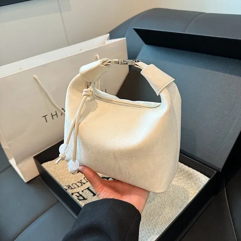 Designer bucket bag discount