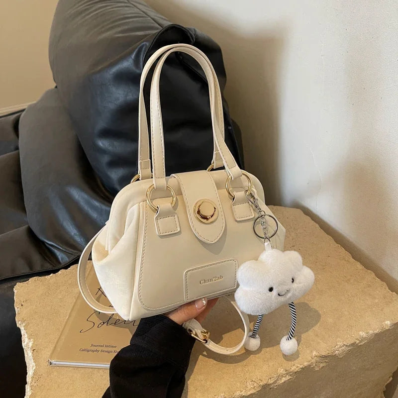 Elegant Cream Designer Inspired Handbag with Charm Accent