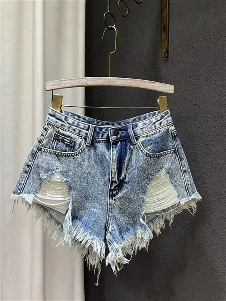 Distressed denim cutoff shorts clearance