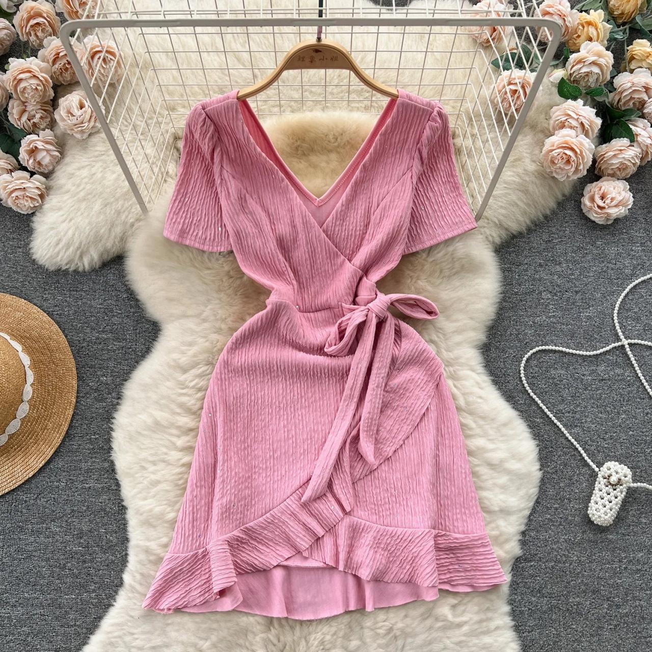 Wrap dress with flounces on sale
