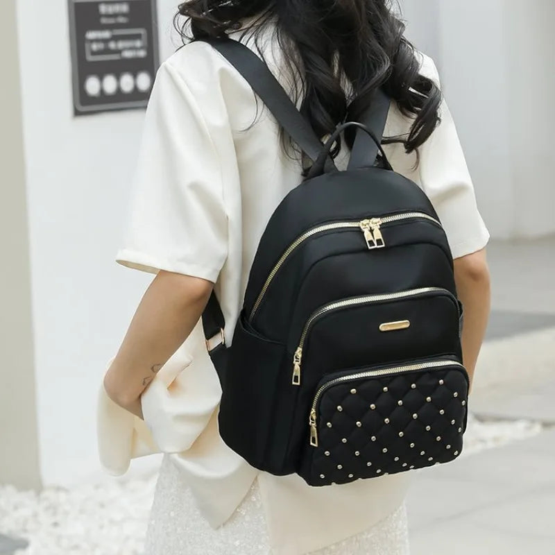 Stylish Quilted Black Backpack With Gold Zippers on Luulla