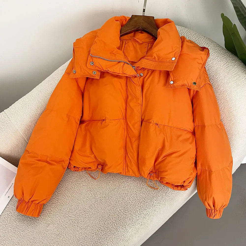 Bright orange puffer jacket top