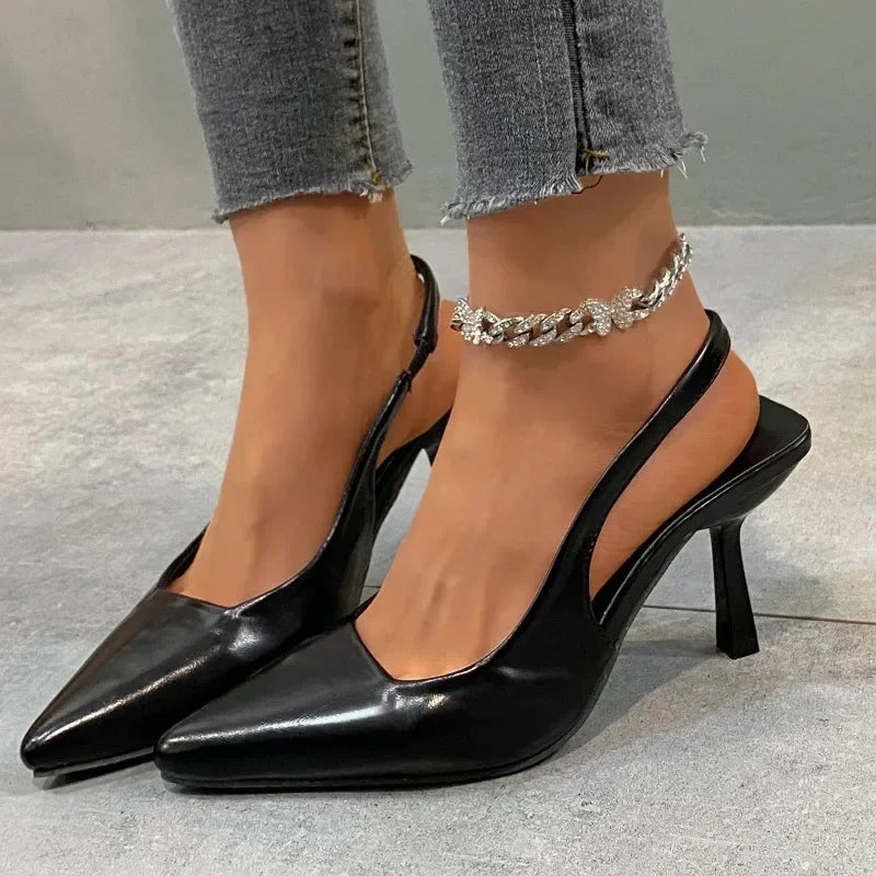 black slingback dress shoes Justine black off-shoulder bow knit mini dress main image 0