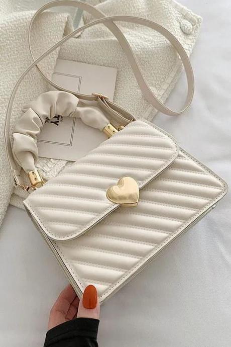 Elegant Quilted Crossbody Bag With Heart Clasp End
