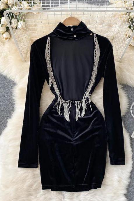 Elegant Velvet Dress With Tassel Detail And High Neck