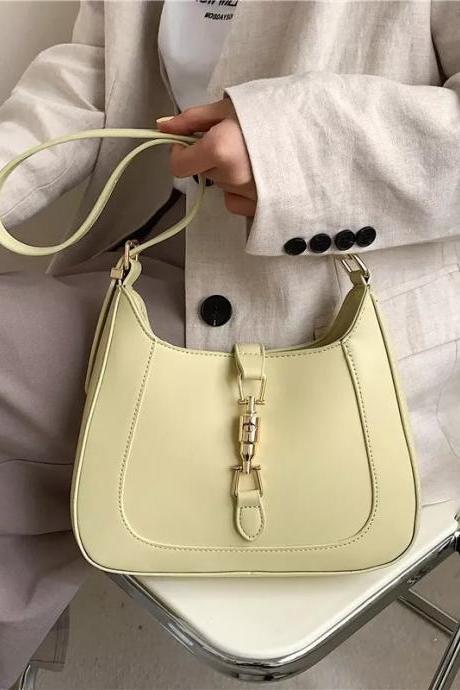 Elegant Lemon Yellow Ladies Handbag With Gold Accents